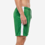 Dark green soccer shorts showing full-length white contrast side panel from waistband to straight hem, right side view
