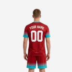 Full-dye sublimated dark red soccer jersey with teal V-neck band and gradient sleeve cuffs, close detail