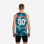 Side view of teal digital camo basketball jersey showing orange armhole binding and orange side seam piping detail