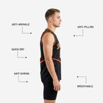 Right side view of black and orange dot pattern basketball jersey showing armhole binding and side panel construction detail