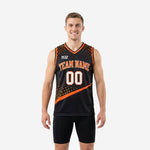 Custom black and orange basketball jerseys with gradient dot pattern, arced team name, and front number 00 - men's sleeveless sublimated jersey front view