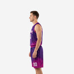 Side view of purple and magenta sublimated basketball uniform set showing V-neck binding armhole trim and shorts side split