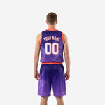 Back view of custom purple basketball uniform with player name and number sublimated onto galaxy design jersey and shorts