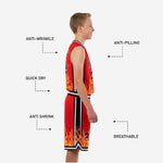 Detail view of the red basketball shorts hem showing black-and-white banded cuff, orange and yellow flame sublimation graphic, and thigh number placement
