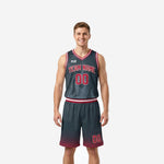 Flame pattern travel basketball uniforms in charcoal and red with sublimated team name arc and matching shorts, front view on male model