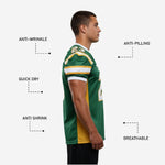 Close detail of green and gold football jersey sleeve showing gold and white stripe bands sublimated at shoulder cap and cuff