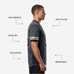 Back view of custom football jerseys for schools showing back number and nameplate area in charcoal and black