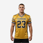 Football jerseys with names and numbers in gold and black mesh, team name arced across chest and large front number 23 on adult male model