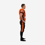 Front view of custom orange and black American football uniform for leagues showing V-neck collar black shoulder panels and large front number on jersey with black pants
