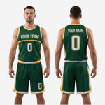 Back view of forest green and gold custom basketball uniform set showing player name and number placement