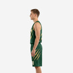 Left-side view of men's forest green sublimated basketball jersey and matching shorts with gold binding detail