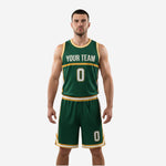 Front view of forest green and gold custom basketball kit with team name and number, custom basketball kits by K2 Sportswear