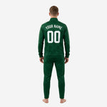 Close-up of forest green sublimated soccer tracksuit jacket showing white crest print zone and player number on chest