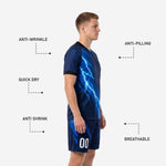 Custom navy shorts with electric blue lightning graphic and sublimated player number, part of full blue soccer uniform kit