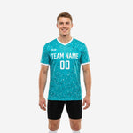 Men's full print custom dye sublimated training jersey in teal and white splash pattern, front view showing team name and number on chest