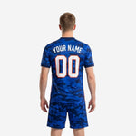 Full print custom men's soccer uniforms in Royal Blue camo, back view showing player name and number 00 sublimated on the jersey