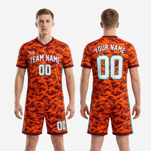 Athletic Orange camo soccer uniform with teal vertical stripe on shorts outer seam, close side view