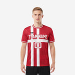 Full print custom red soccer shirt in crimson and white stripe worn by adult male model, front view showing team name and number placement