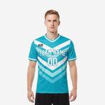 Full print custom soccer tops in teal and white chevron design, front view on adult male model