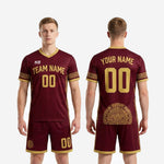 Full-dye sublimated maroon and gold men's soccer uniform set with geometric collar and cuff trim