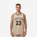 Full sublimation basketball jerseys in tan and brown with arched team name and front number 23 on adult male model, front and back view