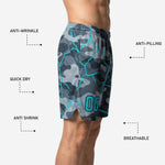 Back view of custom grey camo basketball shorts with full-dye sublimation print covering all rear panels