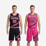 Matching shorts detail showing elastic waistband drawcord pink trim hem and sublimated number on black reversible shorts
