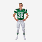 Full sublimation youth football uniforms in Kelly green and white with arced team name, front number 32, V-neck collar, and matching white pants with green leg stripe - front view