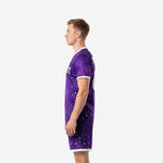 Right side view of sublimated purple soccer uniforms displaying Royal Purple galaxy print shorts and V-neck jersey with white contrast cuffs