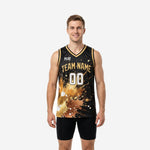 Gold basketball jerseys with black base and full-coverage gold paint-splash graphic, arced team name across chest and front number 00 in white with gold outline, V-neck with gold binding, men's front view