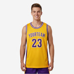 Custom gold basketball jerseys in gold and purple with white trim, team name arced on chest and number 23 on front, worn by adult male model - front and back view