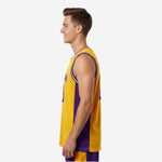 Side view of custom gold and purple sublimated basketball jersey showing purple side panel running from armhole binding to straight hem