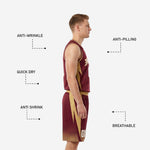 Back view of custom maroon and gold basketball uniforms showing back number placement on jersey and halftone gold dot fade on shorts hem