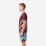 Right side view of maroon men's soccer team uniforms with alternating powder blue and gold ray pattern across the full jersey body
