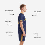 Athletic gold V-neck collar trim detail on navy blue custom soccer uniform kit, close-up of sublimated trim stitching