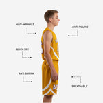 Back view of custom gold youth basketball uniform displaying player name and back number above matching gold shorts