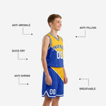 Close detail of gold and royal blue youth basketball shorts showing sublimated number 00 on lower left leg and white V-notch hem trim