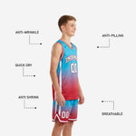 Close-up detail of teal and red youth basketball shorts showing white side panel, red stripe, drawcord waistband, and leg number