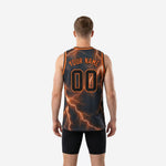 Opposite side view of the orange and gray lightning basketball jersey confirming side vent and hip-length hem on adult male model