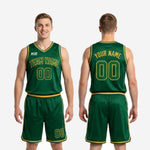 Full set view of custom green and gold basketball uniforms showing matching sublimated jersey and shorts with unified gold trim throughout