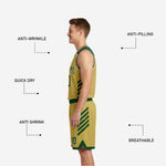 Close-up detail of the green and gold reversible basketball shorts showing player number on left leg, contrast waistband, and hem stripe