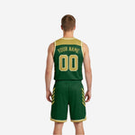 Side view of the green and gold reversible basketball uniform showing the angled slash accent panels on the jersey and matching shorts