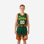 Green and gold youth basketball uniforms with fire flame sublimation pattern, V-neck jersey and matching shorts, front and back view