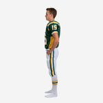 Left side view of sublimated green and gold youth football uniform showing gold side panel on jersey and vertical stripe on white pants