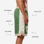 Back view of custom green and white basketball shorts showing green mesh body, cream side panels, and gold stripe hem border