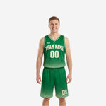 Green and white reversible basketball uniforms front view showing kelly green dot-fade jersey and matching shorts with cream-white arched team name and number 00
