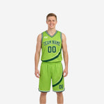 Lime green side of the custom reversible basketball uniform set with forest green swoosh and arched team name on chest