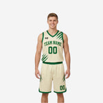 Cream white reverse side of green and white reversible basketball uniforms with green slash graphic and green trim on jersey and shorts