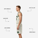 Shorts detail of green and white reversible basketball uniform set showing elastic waistband drawcord and topographic wave pattern on matching shorts