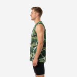 Side view of sublimated green camo basketball jersey showing armhole binding, straight hem, and full-coverage lightning crackle design